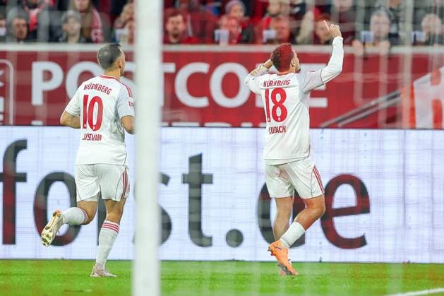 03 10 2025, Football, Fortuna Düsseldorf 1 FC Nürnberg, 2 Fußball Bundesliga, Merkur Spiel Arena, Saison 2025 2026 Goal celebration after the goal to 1 0 by scorer Rafael Lubach 1FC Nuernberg 18 together with Julian Justvan 1FC Nuernberg 10 DFB regulations prohibit any use of photographs as image sequences and or quasi video Nordrhein Westfalen Germany