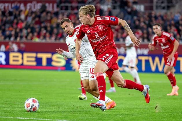 03 10 2025, Football, Fortuna Düsseldorf 1 FC Nürnberg, 2 Fußball Bundesliga, Merkur Spiel Arena, Saison 2025 2026 Jesper Daland Fortuna Düsseldorf 02 in duel against Rafael Lubach 1FC Nuernberg 18 DFB regulations prohibit any use of photographs as image sequences and or quasi video Nordrhein Westfalen Germany