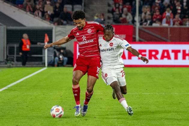 03 10 2025, Soccer 2 Bundesliga, Season 2025 2026, Matchday 08, Fortuna Duesseldorf 1 FC Nuernberg in the Merkur Spiel Arena in Duesseldorf duel between Emmanuel Iyoha Fortuna Duesseldorf, 19 and Mohamed Ali Zoma 1 FC Nuernberg, 23 Important note In accordance with the regulations of the DFL German Football League and the DFB German Football Association, it is prohibited to use or have used photographs taken in the stadium or of the match in the form of sequential images or video-like photo series Foto Kirchner Media Thomas Haesler Copyright: xKirchner-Media ThomasxHaeslerx