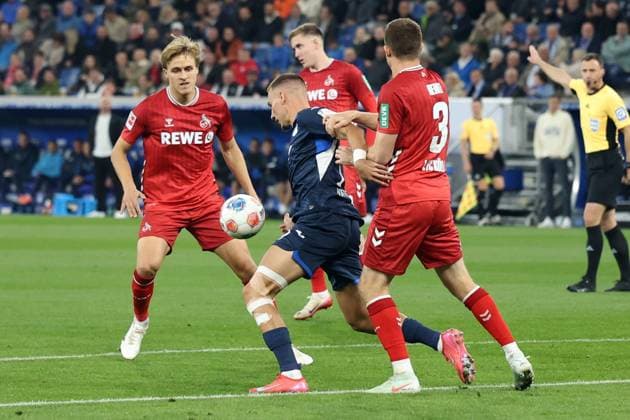 03 10 2025, xrekx, Soccer 1 Bundesliga, TSG 1899 Hoffenheim 1 FC Köln v l Timo Hübers Huebers 1 FC Koeln Tim Lemperle TSG 1899 Hoffenheim Dominique Heintz 1 FC Koeln DFL DFB REGULATIONS PROHIBIT ANY USE OF PHOTOGRAPHS as IMAGE SEQUENCES and or QUASI VIDEO Sinsheim