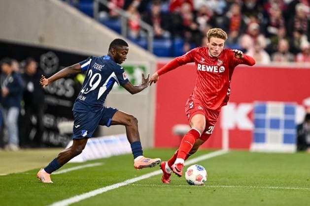 Bazoumana TourÃ (1899 Hoffenheim) und Sebastian Sebulonsen (1. FC Köln) im Zweikampf waehrend des spiels der Bundesliga zwischen TSG Hoffenheim und 1. FC Köln, PreZero Arena am 03. October 2025 in Sinsheim, Deutschland. (Foto von Harry Langer DeFodi Images) +++ Bazoumana TourÃ (1899 Hoffenheim) und Sebastian Sebulonsen (1. FC Köln) battle for the ball during the Bundesliga match between TSG Hoffenheim and 1. FC Köln at PreZero Arena on October 3, 2025 in Sinsheim, Germany. (Photo by Harry Langer DeFodi Images) DFL regulations prohibit any use of photographs as image sequences and or quasi-video. (Photo by Harry Langer DeFodi Images) DFL regulations prohibit any use of photographs as image sequences and or quasi-video. Bazoumana TourÃ 1899 Hoffenheim and Sebastian Sebulonsen 1 FC Köln in a duel during the Bundesliga match between TSG Hoffenheim and 1 FC Köln, PreZero Arena on 03 October 2025 in Sinsheim, Germany Photo by Harry Langer DeFodi Images Bazoumana TourÃ 1899 Hoffenheim and Sebastian Sebulonsen 1 FC Köln battle for the ball during the Bundesliga match between TSG Hoffenheim and 1 FC Köln at PreZero Arena on October 3, 2025 in Sinsheim, Germany Photo by Harry Langer DeFodi Images DFL regulations prohibit any use of photographs as image sequences and or quasi video Photo by Harry Langer DeFodi Images DFL regulations prohibit any use of photographs as image sequences and or quasi video