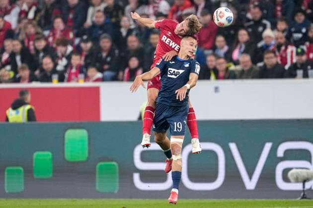 from left Timo Bernd Hübers Cologne, 4 , Tim Lemperle Hoffenheim, 19 , header, header duel, game scene, duel in the air, action, action, 03 10 2025, Sinsheim Germany , Football, Bundesliga, TSG 1899 Hoffenheim 1 FC Köln, DFB DFL REGULATIONS PROHIBIT ANY USE OF PHOTOGRAPHS AS IMAGE SEQUENCES AND OR QUASI VIDEO xozx