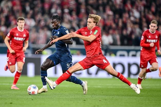 Ihlas Bebou (1899 Hoffenheim) und Timo Hübers (1. FC Köln) im Zweikampf waehrend des spiels der Bundesliga zwischen TSG Hoffenheim und 1. FC Köln, PreZero Arena am 03. October 2025 in Sinsheim, Deutschland. (Foto von Harry Langer DeFodi Images) +++ Ihlas Bebou (1899 Hoffenheim) und Timo Hübers (1. FC Köln) battle for the ball during the Bundesliga match between TSG Hoffenheim and 1. FC Köln at PreZero Arena on October 3, 2025 in Sinsheim, Germany. (Photo by Harry Langer DeFodi Images) DFL regulations prohibit any use of photographs as image sequences and or quasi-video. (Photo by Harry Langer DeFodi Images) DFL regulations prohibit any use of photographs as image sequences and or quasi-video. Ihlas Bebou 1899 Hoffenheim and Timo Hübers 1 FC Köln in a duel during the Bundesliga match between TSG Hoffenheim and 1 FC Köln, PreZero Arena on 03 October 2025 in Sinsheim, Germany Photo by Harry Langer DeFodi Images Ihlas Bebou 1899 Hoffenheim and Timo Hübers 1 FC Köln battle for the ball during the Bundesliga match between TSG Hoffenheim and 1 FC Köln at PreZero Arena on October 3, 2025 in Sinsheim, Germany Photo by Harry Langer DeFodi Images DFL regulations prohibit any use of photographs as image sequences and or quasi video Photo by Harry Langer DeFodi Images DFL regulations prohibit any use of photographs as image sequences and or quasi video