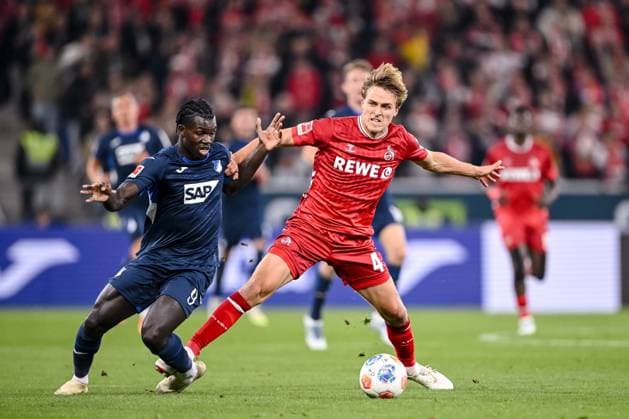 Ihlas Bebou (1899 Hoffenheim) und Timo Hübers (1. FC Köln) im Zweikampf waehrend des spiels der Bundesliga zwischen TSG Hoffenheim und 1. FC Köln, PreZero Arena am 03. October 2025 in Sinsheim, Deutschland. (Foto von Harry Langer DeFodi Images) +++ Ihlas Bebou (1899 Hoffenheim) und Timo Hübers (1. FC Köln) battle for the ball during the Bundesliga match between TSG Hoffenheim and 1. FC Köln at PreZero Arena on October 3, 2025 in Sinsheim, Germany. (Photo by Harry Langer DeFodi Images) DFL regulations prohibit any use of photographs as image sequences and or quasi-video. (Photo by Harry Langer DeFodi Images) DFL regulations prohibit any use of photographs as image sequences and or quasi-video. Ihlas Bebou 1899 Hoffenheim and Timo Hübers 1 FC Köln in a duel during the Bundesliga match between TSG Hoffenheim and 1 FC Köln, PreZero Arena on 03 October 2025 in Sinsheim, Germany Photo by Harry Langer DeFodi Images Ihlas Bebou 1899 Hoffenheim and Timo Hübers 1 FC Köln battle for the ball during the Bundesliga match between TSG Hoffenheim and 1 FC Köln at PreZero Arena on October 3, 2025 in Sinsheim, Germany Photo by Harry Langer DeFodi Images DFL regulations prohibit any use of photographs as image sequences and or quasi video Photo by Harry Langer DeFodi Images DFL regulations prohibit any use of photographs as image sequences and or quasi video