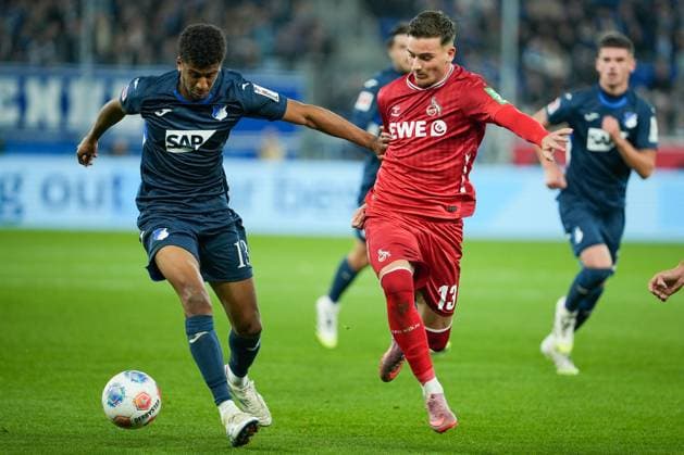 Soccer Bundesliga, Matchday 6, TSG Hoffenheim 1 FC Köln on 03 10 2025 in Sinsheim PreZero Arena , Germany, Season 2025 2026 DFL REGULATIONS PROHIBIT ANY USE OF PHOTOGRAPHS AS IMAGE SEQUENCES AND OR QUASI VIDEO Bernardo 13, TSG in duel with Said El Mala 13, KOE Sinsheim PreZero Arena Germany Copyright: xChristophxKinzingerx