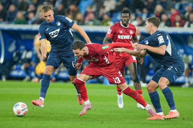 Soccer Bundesliga, Matchday 6, TSG Hoffenheim 1 FC Köln on 03 10 2025 in Sinsheim PreZero Arena , Germany, Season 2025 2026 DFL REGULATIONS PROHIBIT ANY USE OF PHOTOGRAPHS AS IMAGE SEQUENCES AND OR QUASI VIDEO Said El Mala 13, KOE tanks against Robin Hranac 2, TSG and Grischa Prömel 6, TSG by Sinsheim PreZero Arena Germany Copyright: xChristophxKinzingerx