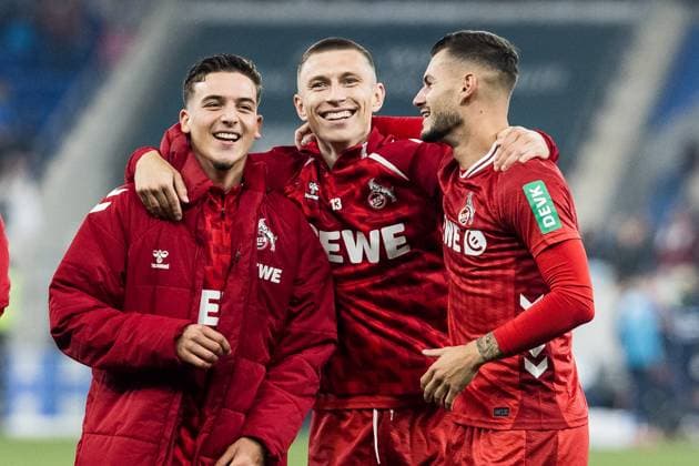 1 Soccer Bundesliga TSG 1899 Hoffenheim 1 FC Köln 03 10 2025 Said El Mala 1 FC Köln, 13 , Kristoffer Lund 1 FC Köln, 32 , Tom Krauß 1 FC Köln, 5 laughing in front of the curve, celebrating the victory with the fans 1 Soccer Bundesliga, TSG 1899 Hoffenheim 1 FC Köln, Sinsheim, PREZERO Arena on 03 10 2025 DFL REGULATIONS PROHIBIT ANY USE OF PHOTOGRAPHS AS IMAGE SEQUENCES AND OR QUASI VIDEO Copyright: xBEAUTIFULxSPORTS Wunderlx