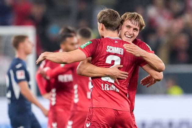 from left Joel Schmied Cologne, 2 , Timo Bernd Hübers Cologne, 4 , players of 1 FC Cologne, cheering after the final whistle, joy about the victory, winner, winner, cheers, cheering, cheerful, positive, happy, rejoice, optimistic, Highlight, Action, Action, 03 10 2025, Sinsheim Germany , Soccer, Bundesliga, TSG 1899 Hoffenheim 1 FC Köln, DFB DFL REGULATIONS PROHIBIT ANY USE OF PHOTOGRAPHS AS IMAGE SEQUENCES AND OR QUASI VIDEO xozx