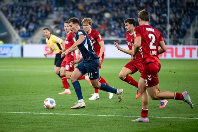 Fisnik Asllani TSG Hoffenheim, 11 on the ball, next to him Timo Huebers FC Koeln, 04 , Joel Schmied FC Koeln, 02 , GER, TSG 1899 Hoffenheim vs 1 FC Koeln, Fussball Bundesliga, 6 Spieltag, Saison 2025 2026, 03 10 2025 DFB DFL regulations prohibit any use of photographs as image sequences and or quasi video GER, TSG 1899 Hoffenheim vs 1 FC Koeln, Fussball Bundesliga, 6 Spieltag, Saison 2025 2026, 03 10 2025 Sinsheim Copyright: xEibner-Pressefoto Memmlerx EP_MMR