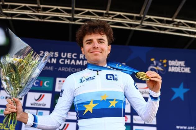 Belgian Jarno Widar celebrates on the podium after winning the 121,1 km Men U23 Road Race at the UEC road European cycling championships, in France on Saturday 04 October 2025. The European cycling championships in Drome-Ardeche takes place from 1 to 5 October. DAVIDxPINTENS  x136043651x