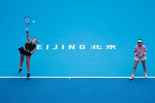 BEIJING, CHINA - OCTOBER 04: Hsieh Su-wei of Chinese Taipei and Jelena Ostapenko of Latvia return a shot in the Women s Doubles Semifinal match against Sara Errani of Italy and Jasmine Paolini of Italy on day 13 of the 2025 China Open at the National Tennis Center on October 4, 2025 in Beijing, China.  Copyright: xChinaxNewsxServicex 111595033099