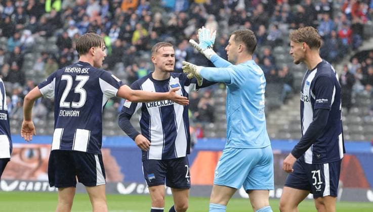 Kennet Eichhorn, Marten Winkler, goalkeeper Tjark Ernst cheers after parade Joy Emotion Cheering Sport Soccer Football DFL 2 Bundesliga Men 8 Matchday Season 2025 2026 04 10 2025 Hertha BSC Berlin vs Preußen Münster DFL regulations prohibit any use of photographs as image sequences and or quasi video