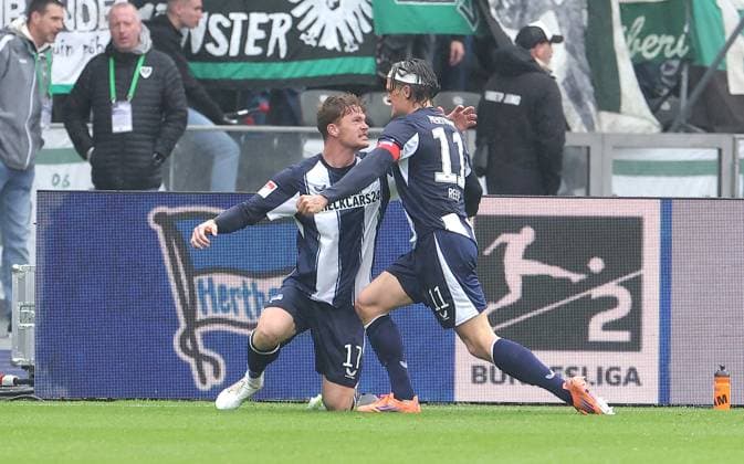 Sebastian Grönning cheers after 1 0 with Fabian Reese Joy Emotion Jubilation Sport Football Soccer DFL 2 Bundesliga Men 8 Matchday Season 2025 2026 04 10 2025 Hertha BSC Berlin vs Preußen Münster DFL regulations prohibit any use of photographs as image sequences and or quasi video