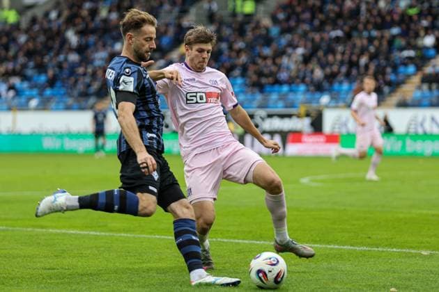 Lukas Kluenter SV Waldhof Mannheim, 24 in duel against Frederik Christensen VfL Osnabr ck, 3 at SV Waldhof Mannheim VfL Osnabrueck on 04 10 25 at Carl Benz Stadium, Mannheim xamx Photo Alfio Marino Copyright: