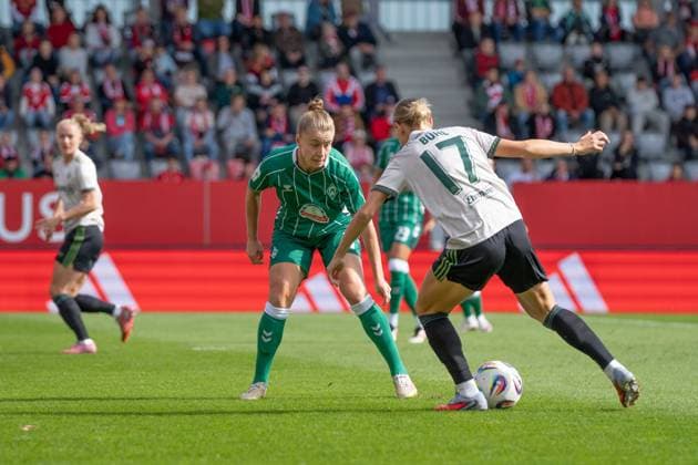 Michelle Ulbrich 5 Bremen and Klara Bühl 17 FC Bayern in action at the Google Pixel Womens Bundesliga match FC Bayern Munich SV Werder Bremen on 04 10 2025 Munich FC Bayern Campus Bayern Germany