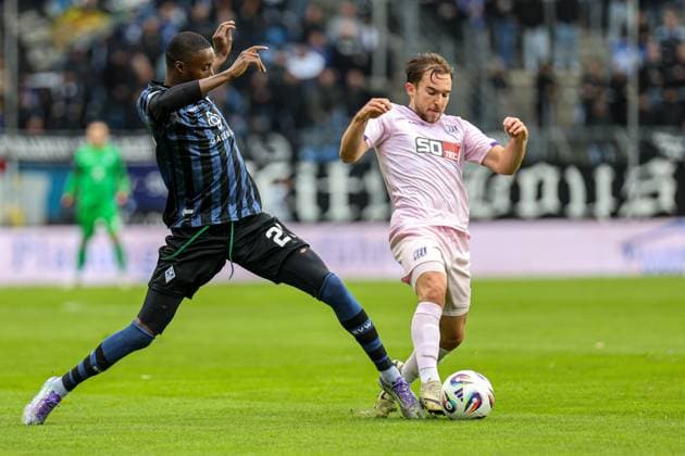 Adama Diakhaby SV Waldhof Mannheim, 27 in duel against Frederik Christensen VfL Osnabr ck, 3 at SV Waldhof Mannheim VfL Osnabrueck on 04 10 25 at Carl Benz Stadium, Mannheim xamx Photo Alfio Marino Copyright: