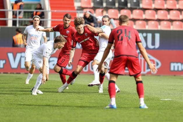 3 Liga FC Ingolstadt 04 SSV Ulm duel Battle for the ball Frederik Christensen 11, FCI Chessa Dennis 11 Ulm 3 Liga FC Ingolstadt 04 Season 2025 2026 SSV Ulm