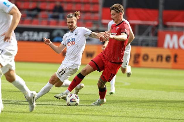 3 Liga FC Ingolstadt 04 SSV Ulm duel Battle for the ball Frederik Christensen 11, FCI Chessa Dennis 11 Ulm 3 Liga FC Ingolstadt 04 Season 2025 2026 SSV Ulm