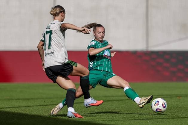 from left Klara Bühl FC Bayern München, 17 and Michelle Weiß SV Werder Bremen, 15 in a duel, dynamic, action, action, game scene, THE DFB GUIDELINES PROHIBIT ANY USE OF PHOTOGRAPHS AS IMAGE SEQUENCES AND OR QUASI VIDEO DFB REGULATIONS PROHIBIT ANY USE OF PHOTOGRAPHS AS IMAGE SEQUENCES AND OR QUASI VIDEO , 04 10 2025, Munich Germany , Football, Google Pixel Womens Bundesliga, FC Bayern Munich SV Werder Bremen xobx