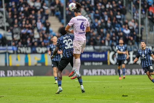 Yigit Karademir VfL Osnabr ck, 4 with his head behind Kennedy Okpala SV Waldhof Mannheim, 32 at SV Waldhof Mannheim VfL Osnabrueck on 04 10 25 at Carl Benz Stadium, Mannheim xamx Photo Alfio Marino Copyright:
