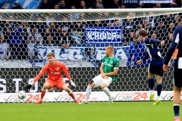 DEU, DFL, 2 FBL, Hertha BSC vs Preussen Muenster, 04 10 2025, Berliner Olympiastadion, Berlin, DEU, DFL, 2 FBL, Hertha BSC vs Preussen Muenster, im Bild 2 0 durch Sebastian Groenning Hertha BSC Berlin 17 , Johannes Schenk Preussen Muenster 1 , Mikkel Kirkeskov Preussen Muenster 2 DFL regulations prohibit any use of Photographs as image sequences and or quasi video nordphotoxGmbHx xEngler nph00076