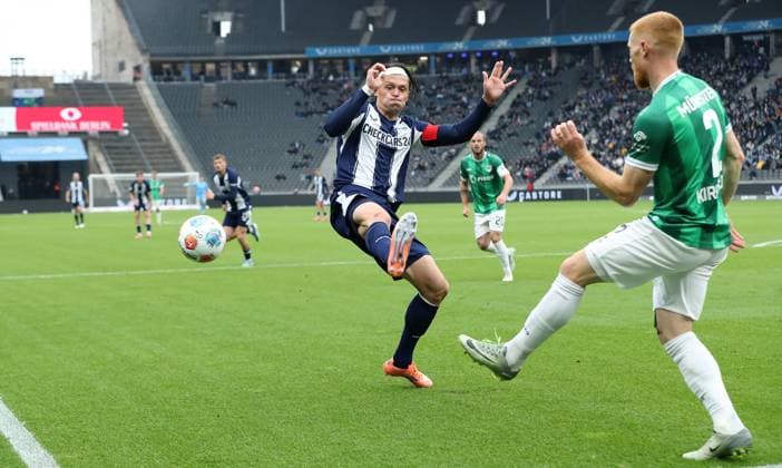 Fabian Reese, Mikkel Kirkeskov duel match scene Action Sport Football Soccer DFL 2 Bundesliga Men 8 Matchday Season 2025 2026 04 10 2025 Hertha BSC Berlin vs Preußen Münster DFL regulations prohibit any use of photographs as image sequences and or quasi video