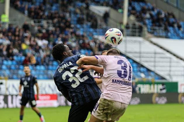 Kennedy Okpala SV Waldhof Mannheim, 32 and Lukas Jonsson VfL Osnabr ck, 21 in a duel during SV Waldhof Mannheim VfL Osnabrueck on 04 10 25 at Carl Benz Stadium, Mannheim xamx Photo Alfio Marino Copyright: