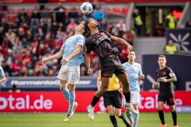 DFL Bayer 04 Leverkusen 1 FC Union Berlin, 04 10 2025 Andras Schäfer 1 FC Union Berlin, 13 and Loic Bade Bayer 04 Leverkusen, 5 at the header Bayer 04 Leverkusen 1 FC Union Berlin on matchday 6 of the 1 German Soccer League on 04 10 2025 at the BayArena in Leverkusen THE DFL REGULATIONS PROHIBIT ANY USE OF PHOTOS AS PICTURE SEQUENCES AND OR QUASI VIDEO Bayer 04 Leverkusen 1 FC Union Berlin on Matchday 6 of the 1 Bundesliga on 04 10 2025 at the BayArena in Leverkusen DFL REGULATIONS PROHIBIT ANY USE OF PHOTOGRAPHS AS IMAGE SEQUENCES AND OR QUASI VIDEO Copyright: xBEAUTIFULxSPORTS AxelxKohringx