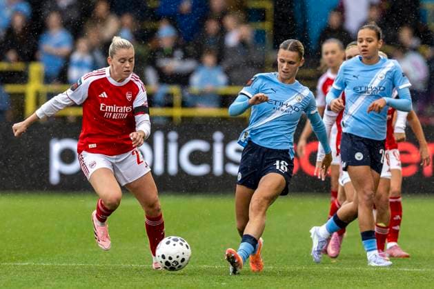 4th October 2025; Joie Stadium, Manchester, England; Womens Super League Football, Manchester City versus Arsenal; Kerstin Casparji of Manchester City Women and Alessia Russo of Arsenal Women chase a loose ball  TimxWilliams