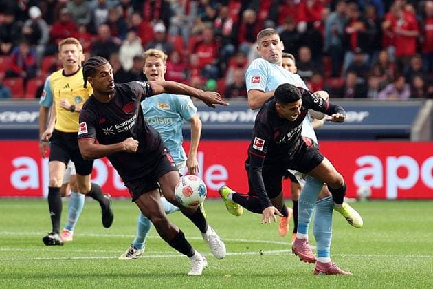 04 10 2025, xrekx, Soccer 1 Bundesliga, Bayer 04 Leverkusen 1 FC Union Berlin v l Loic Bade Bayer 04 Leverkusen Andrej Ilic Union Berlin Equi Fernandez Bayer 04 Leverkusen DFL DFB REGULATIONS PROHIBIT ANY USE OF PHOTOGRAPHS as IMAGE SEQUENCES and or QUASI VIDEO Leverkusen