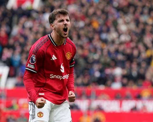 Manchester, England, 4th October 2025. Mason Mount of Manchester United, ManU celebrates after scoring the opening goal during the Manchester United vs Sunderland Premier League match at Old Trafford, Manchester. Picture credit should read: Andrew Yates Sportimage EDITORIAL USE ONLY. No use with unauthorised audio, video, data, fixture lists, club league logos or live services. Online in-match use limited to 120 images, no video emulation. No use in betting, games or single club league player publications. SPI_002_AY_MAN_UTD_SUN SPI-4195-0002