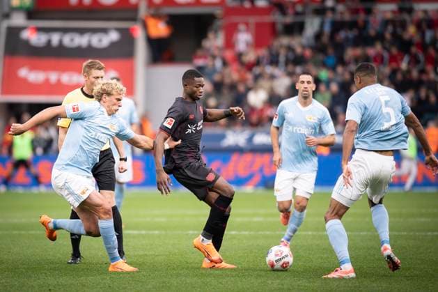 DFL Bayer 04 Leverkusen 1 FC Union Berlin, 04 10 2025 Three players from 1 FC Union Berlin try to defend Christian Kofane Bayer 04 Leverkusen, 35 Leopold Querfeld 1 FC Union Berlin, 14 , Rani Khedira 1 FC Union Berlin, 8 , Danilo Doekhi 1 FC Union Berlin, 5 Bayer 04 Leverkusen 1 FC Union Berlin on matchday 6 of the 1 Bundesliga on 04 10 2025 at the BayArena in Leverkusen THE DFL REGULATIONS PROHIBIT ANY USE OF PHOTOS AS PICTURE SEQUENCES AND OR QUASI VIDEO Bayer 04 Leverkusen 1 FC Union Berlin on Matchday 6 of the 1 Bundesliga on 04 10 2025 at the BayArena in Leverkusen DFL REGULATIONS PROHIBIT ANY USE OF PHOTOGRAPHS AS IMAGE SEQUENCES AND OR QUASI VIDEO Bayer 04 Leverkusen 1 FC Union Berlin on matchday 6 of Bundesliga 1 at BayArena in Leverkusen on 04 10 2025 THE DFL REGULATIONS PROHIBIT ANY USE OF PHOTOGRAPHS AS IMAGE SEQUENCES AND OR QUASI VIDEO Bayer 04 Leverkusen 1 FC Union Berlin on matchday 6 of Bundesliga 1 at BayArena in Leverkusen on 04 10 2025 QUASI VIDEO Bayer 04 Leverkusen 1 FC Union Berlin on Matchday 6 of the 1 Bundesliga on 04 10 2025 at the BayArena in Leverkusen DFL REGULATIONS PROHIBIT ANY USE OF PHOTOGRAPHS AS IMAGE SEQUENCES AND OR QUASI VIDEO Copyright: xBEAUTIFULxSPORTS AxelxKohringx