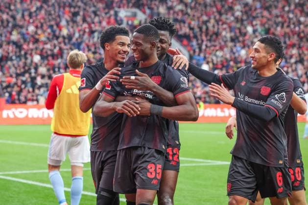 04 10 2025, Soccer, Season 2025 2026, 1 Bundesliga, Matchday 6, Bayer Leverkusen FC Union Berlin, Christian Kofane Bayer Leverkusen celebrates after his goal for 2 to 0 with Malik Tillman Bayer Leverkusen , Edmond Tapsoba Bayer Leverkusen and Equi Fernandez Bayer Leverkusen Leverkusen BayArena NRW Germany xRHR PHOTOx Copyright: RHR-FOTOx RHR-FOTO