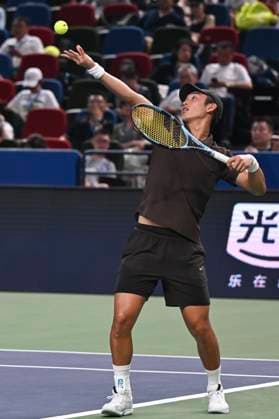 (251004) -- SHANGHAI, Oct. 4, 2025 -- Shang Juncheng serves during the men s singles round of 64 match between Karen Khachanov of Russia and Shang Juncheng of China at the ATP, Tennis Herren World Tour Shanghai Masters tennis tournament in Shanghai, east China, Oct. 4, 2025. ) (SP)CHINA-SHANGHAI-TENNIS-ATP TOUR-SHANGHAI MASTERS-MEN S SINGLES (CN) ChenxHaoming 