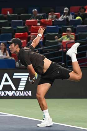 (251004) -- SHANGHAI, Oct. 4, 2025 -- Shang Juncheng serves during the men s singles round of 64 match between Karen Khachanov of Russia and Shang Juncheng of China at the ATP, Tennis Herren World Tour Shanghai Masters tennis tournament in Shanghai, east China, Oct. 4, 2025. ) (SP)CHINA-SHANGHAI-TENNIS-ATP TOUR-SHANGHAI MASTERS-MEN S SINGLES (CN) ChenxHaoming 