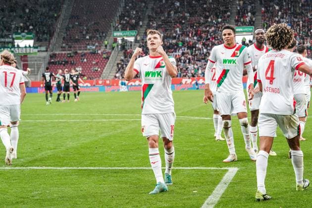 1 Bundesliga 2025 2026 6 Matchday 04 10 2025 FC Augsburg vs VfL Wolfsburg WWK Arena Augsburg, Germany Robin Fellhauer FC Augsburg celebrates after scoring the goal to make it 3 1 Copyright: xLukaxKolanovicx