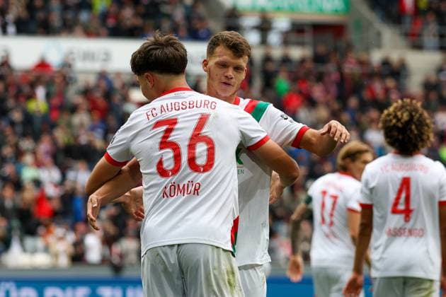 ,Goal celebration by Mert Koemuer 36 FC Augsburg , Robin Fellhauer 19 FC Augsburg to 2 0 FC Augsburg vs VfL Wolfsburg, Football, 1 Bundesliga, 6 Matchday, 04 10 2025 DFB regulations prohibit any use of photographs as image sequences and or quasi video Augsburg Bayern Germany Copyright: xkolbert-press ChristianxKolbertx