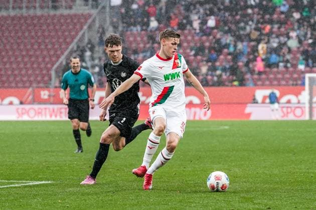 1 Bundesliga 2025 2026 6 Matchday 04 10 2025 FC Augsburg vs VfL Wolfsburg WWK Arena Augsburg, Germany Andreas Skov Olsen VfL Wolfsburg , Anton Kade FC Augsburg Copyright: xLukaxKolanovicx