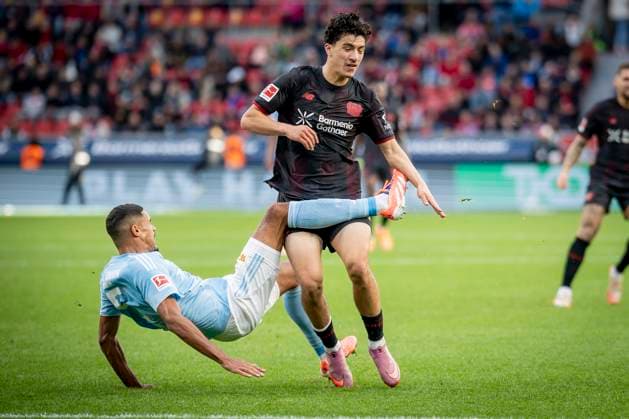 DFL Bayer 04 Leverkusen 1 FC Union Berlin, 04 10 2025 Danilo Doekhi 1 FC Union Berlin, 5 and Ibrahim Maza Bayer 04 Leverkusen, 30 Bayer 04 Leverkusen 1 FC Union Berlin tangle on matchday 6 of the 1 Bundesliga on 04 10 2025 at the BayArena in Leverkusen THE DFL REGULATIONS PROHIBIT ANY USE OF PHOTOS AS PICTURE SEQUENCES AND OR QUASI VIDEO Bayer 04 Leverkusen 1 FC Union Berlin on Matchday 6 of the 1 Bundesliga on 04 10 2025 at the BayArena in Leverkusen DFL REGULATIONS PROHIBIT ANY USE OF PHOTOGRAPHS AS IMAGE SEQUENCES AND OR QUASI VIDEO Bayer 04 Leverkusen 1 FC Union Berlin on matchday 6 of Bundesliga 1 on 04 10 2025 at the BayArena in Leverkusen THE DFL REGULATIONS PROHIBIT ANY USE OF PHOTOGRAPHS AS IMAGE SEQUENCES AND OR QUASI VIDEO Bayer 04 Leverkusen 1 FC Union Berlin on Matchday 6 of the 1 Bundesliga on 04 10 2025 at the BayArena in Leverkusen DFL REGULATIONS PROHIBIT ANY USE OF PHOTOGRAPHS AS IMAGE SEQUENCES AND OR QUASI VIDEO Copyright: xBEAUTIFULxSPORTS AxelxKohringx