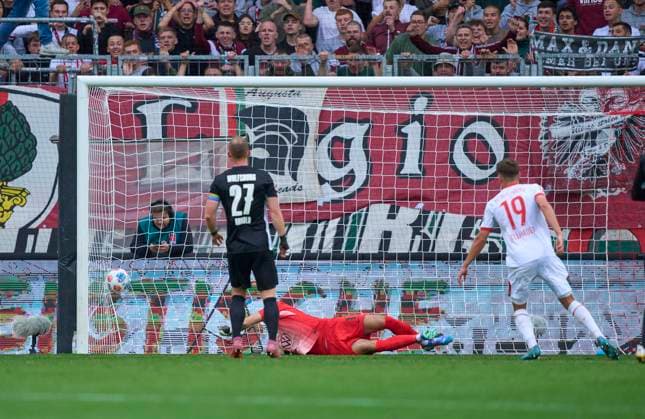 Robin Fellhauer of Augsburg scores, shoots goal , Tor, Treffer, Torschuss, 3-0 in the match FC AUGSBURG - VFL WOLFSBURG on October 4, 2025 in WWK Arena Augsburg, Germany. Season 2025 2026, 1.Bundesliga, FCB, matchday 6, 6.Spieltag