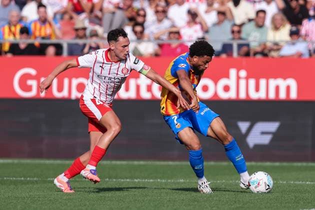 October 4, 2025, Girona, Girona, SPAIN: Arnaut Danjuma of Valencia CF and Arnau Martinez of Girona FC in action during the Spanish league, La Liga EA Sports, football match played between Girona FC and Valencia CF at Montilivi stadium on October 04, 2025 in Girona, Spain. Girona SPAIN - ZUMAa181 20251004_zaa_a181_069 Copyright: xJavierxBorregox