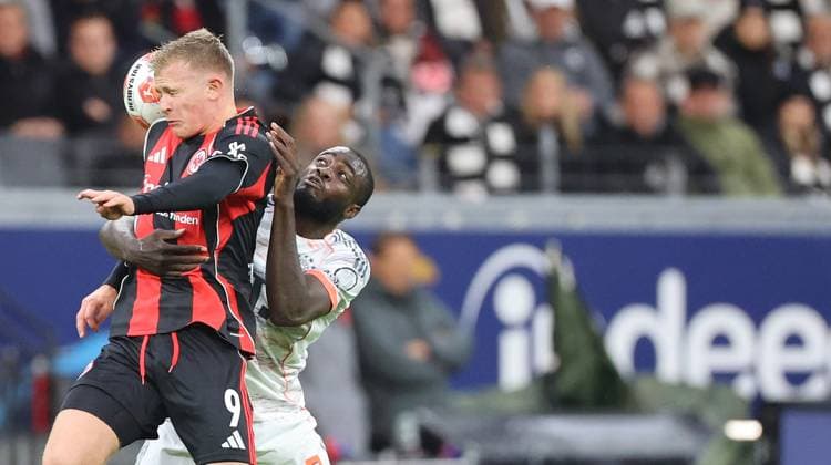 Burkardt - Upamecano , Eintracht Frankfurt-Bayern München , Bundesliga , Fußball , in den Deutsche Bank Park Stadion, in Frankfurt am Main , Hessen , Deutschland. Oktober 04, 2025 . Photo by: Davide Elias IPA Photo Pressefoto DENL Copyright: xDavidexEliasx