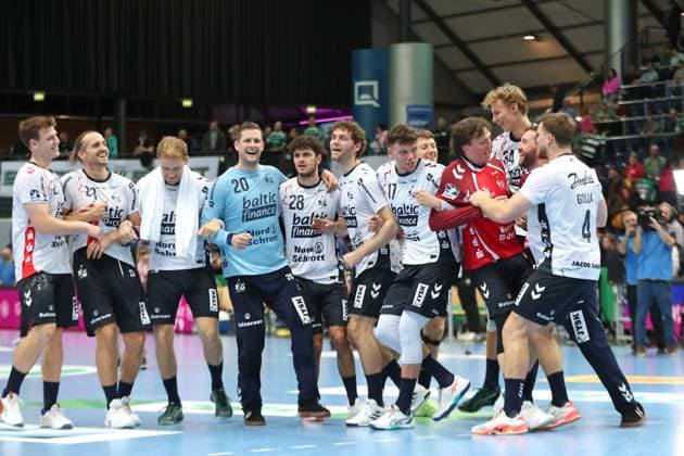 Handball DAIKIN HBL SC DHfK Leipzig SG Flensburg Handewitt 04 10 2025 Flensburg Handewitt team delighted with clear victory Handball, DAIKIN HBL, 1 Bundesliga, Season 2025 2026, Matchday 7 SC DHfK Leipzig vs SG Flensburg Handewitt on 04 10 2025 at Quarterback Immobilien Arena Leipzig Copyright: xBEAUTIFULxSPORTS JanxKaeferx
