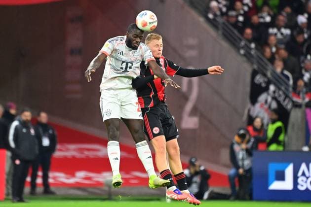 Dayot UPAMECANO Bayern Muenchen , Action,duel against Jonathan BURKARDT Eintracht Frankfurt Football 1 Bundesliga Season 2025 2026, 6 Matchday, Matchday06, Eintracht Frankfurt FC Bayern Muenchen 0 3 on 04 10 2025 DEUTSCHE BANK PARK