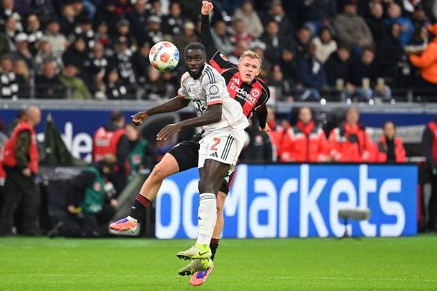 Dayot UPAMECANO Bayern Muenchen , Action,duel against Jonathan BURKARDT Eintracht Frankfurt Football 1 Bundesliga Season 2025 2026, 6 Matchday, Matchday06, Eintracht Frankfurt FC Bayern Muenchen 0 3 on 04 10 2025 DEUTSCHE BANK PARK