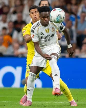 REAL MADRID CF v VILLARREAL CF. LA LIGA 2025 2026. ROUND 8. Real Madrid CF™s Vinicius Junior (f) and Villarreal CF s Santiago Mourino during La Liga match. October 4, 2025. (ALTERPHOTOS Jorge Ropero)  Copyright: xJorgexRoperox