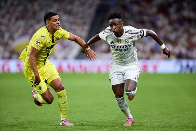 October 4, 2025, Madrid, Madrid, Spain: Vinicius Jr of Real Madrid CF and Alvaro MourioÂ±o of Villarreal CF during La Liga football match between Real Madrid CF v Villareal CF at Santiago Bernabeu Stadium in Madrid, Spain, October 4, 2025 Madrid Spain - ZUMAa206 20251004_zsp_a206_038 Copyright: xRubenxAlbarranx