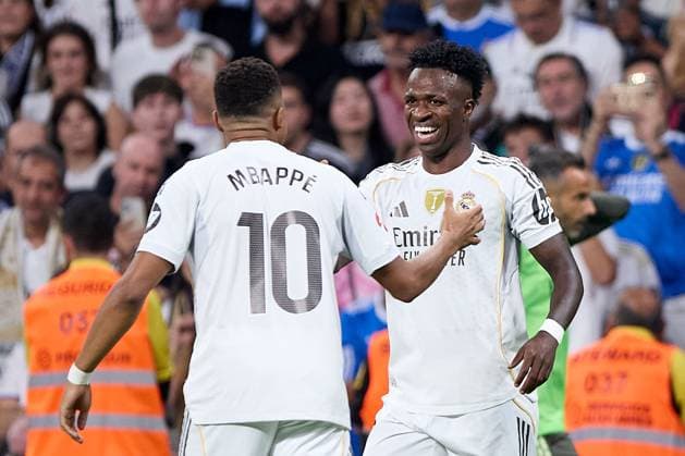 Vinicius Jr of Real Madrid CF celebrates after scoring a goal with Kylian Mbappe of Real Madrid CF Real Madrid v Villarreal, La Liga, Football, Estadio Santiago Bernabu, Madrid, Spain - 04 Oct 2025Madrid Estadio Santiago Bernabu Spain EDITORIAL USE ONLY No use with unauthorised audio, video, data, fixture lists, club league logos or live services. Online in-match use limited to 120 images, no video emulation. No use in betting, games or single club league player publications. Copyright: xRubenxAlbarran Shutterstockx 15516230bn