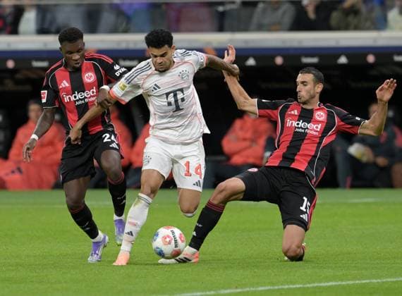 Aurelio Buta li vs Luis Diaz Mi and Ellyes Skhiri re photographed at the soccer Bundesliga match Eintracht li vs Arthur Teathe Frankfurt vs FC Bayern Munich on 4 10 2025 in Frankfurt DFL DFB REGULATIONS PROHIBIT ANY USE OF PHOTOGRAPHS as IMAGE SEQUENCES and or QUASI VIDEO