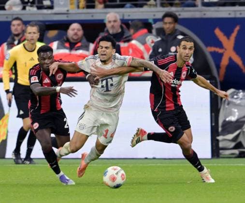 Aurelio Buta li vs Luis Diaz Mi and Ellyes Skhiri re photographed at the soccer Bundesliga match Eintracht li vs Arthur Teathe Frankfurt vs FC Bayern Munich on 4 10 2025 in Frankfurt DFL DFB REGULATIONS PROHIBIT ANY USE OF PHOTOGRAPHS as IMAGE SEQUENCES and or QUASI VIDEO